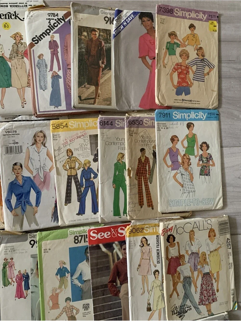 VINTAGE SEWING PATTERN lot of 28 Mixed Women Some Uncut And Cut